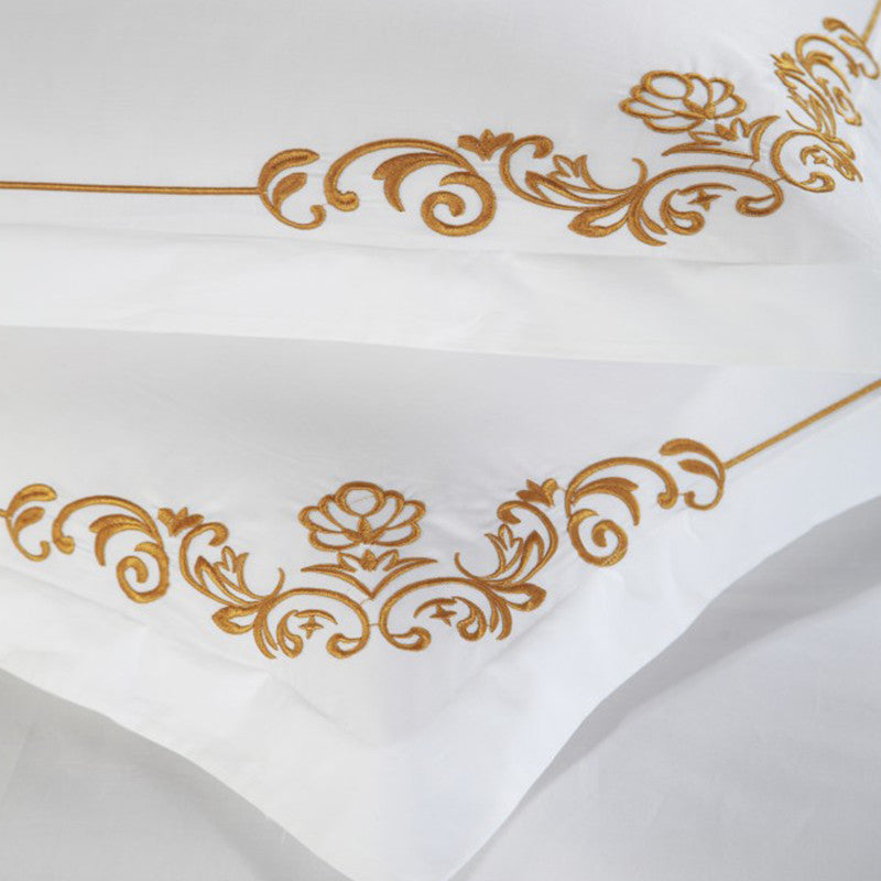 Four-piece cotton bedding set by My Store, shown in soft neutral tones