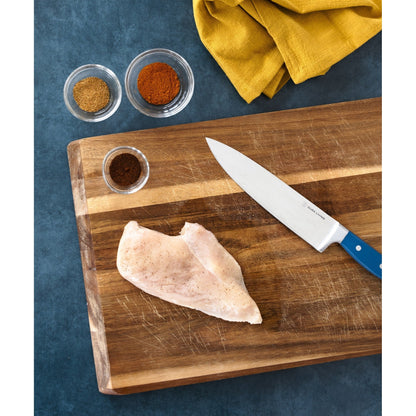 Dura Living Superior 8-inch chef knife with royal blue handle and stainless steel blade, ideal for precise kitchen slicing.