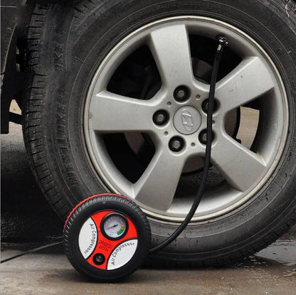 Portable electric tire inflator with car battery power cord for inflating vehicle tires