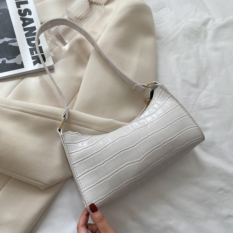 Women's small shoulder and underarm bag by BACKUPMYFILESNOW®, featuring a simple stylish design and compact size.