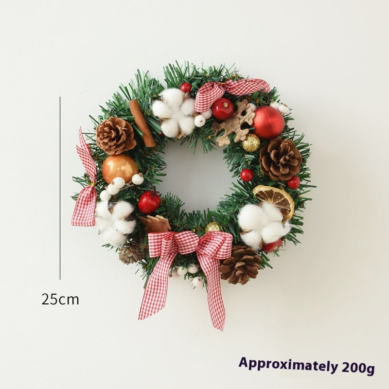 Christmas garland bow door hanging with festive red and green decorations for windows and doors