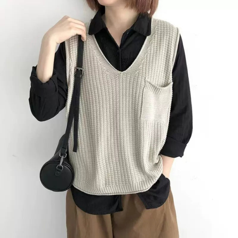 Simple V-neck artistic knit vest in a textured pattern, front view