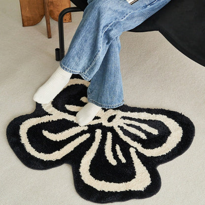 Thickened cold-proof imitation cashmere floor mat in bow-shaped irregular carpet design