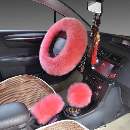 Long wool steering wheel cover with plush textured handle wrap in a neutral color