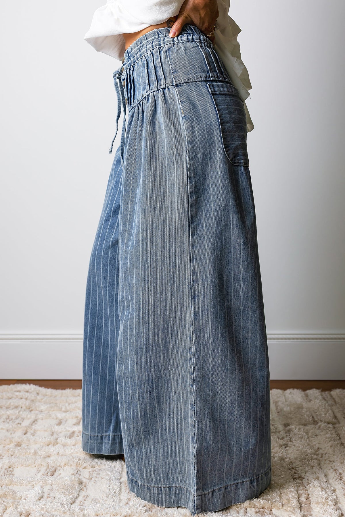 Light blue Sutton casual wide-leg jeans by Threaded Pear, featuring a relaxed fit and classic denim style.