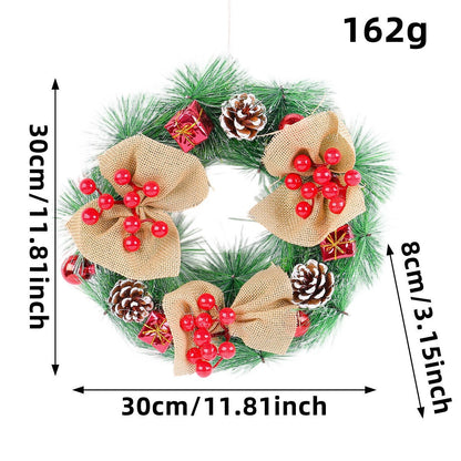 Christmas wreath holiday decoration displayed on a door with festive greenery and ornaments