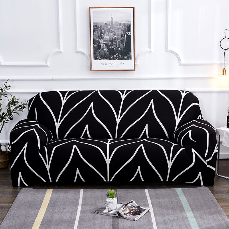 Elastic universal sofa cover in neutral fabric, designed to fit most sofas with a snug, stretchable fit