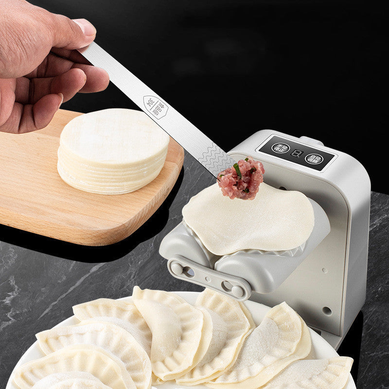 Electric automatic dumpling maker machine for easy kitchen and household dumpling preparation