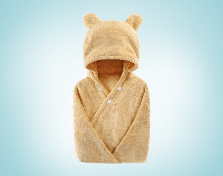 Cotton baby care hooded bath towel with soft hood and absorbent fabric folded neatly