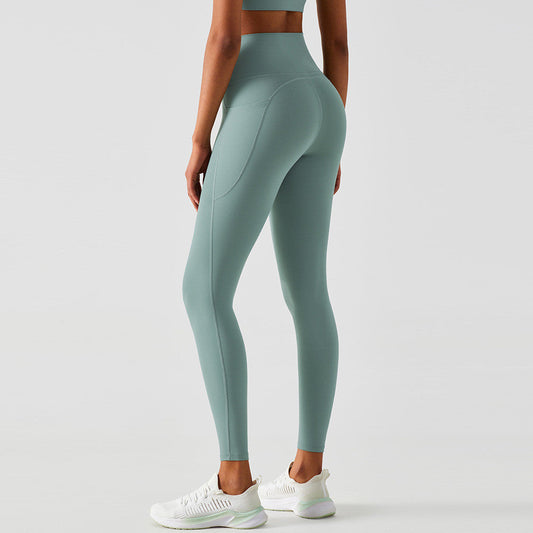 High-waisted peach yoga pants for women with butt-lift design, shown in a fitted running and exercise style