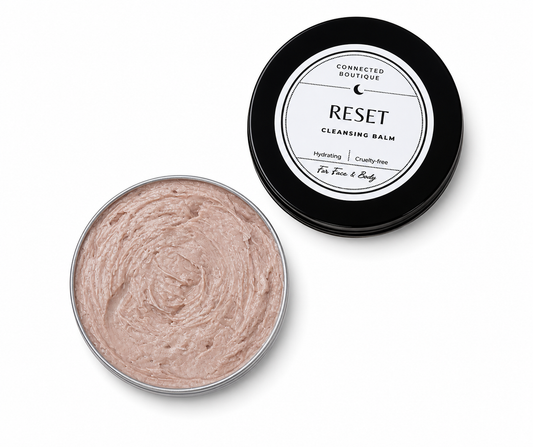Connected Boutique Reset Cleansing Balm, a deep-cleaning makeup melting facial balm, shown in a sleek jar with a smooth texture.