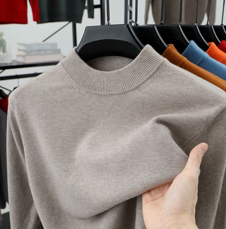 Men's mock-neck sweater base layer in a simple, close-fitting design