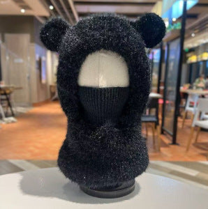 Warm windproof knitted wool hat with earflaps in a cozy textured design
