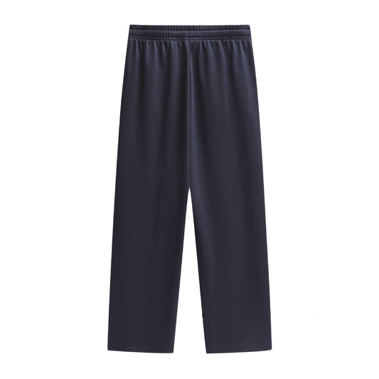 Men's solid-colored casual sports loose-fit trousers from My Store viewed on a model