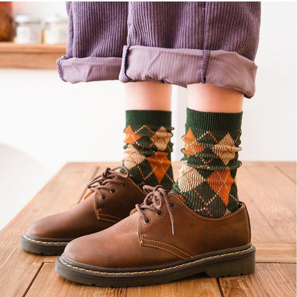 Diamond-patterned women's mid-calf socks for autumn and winter, shown in a soft knit design