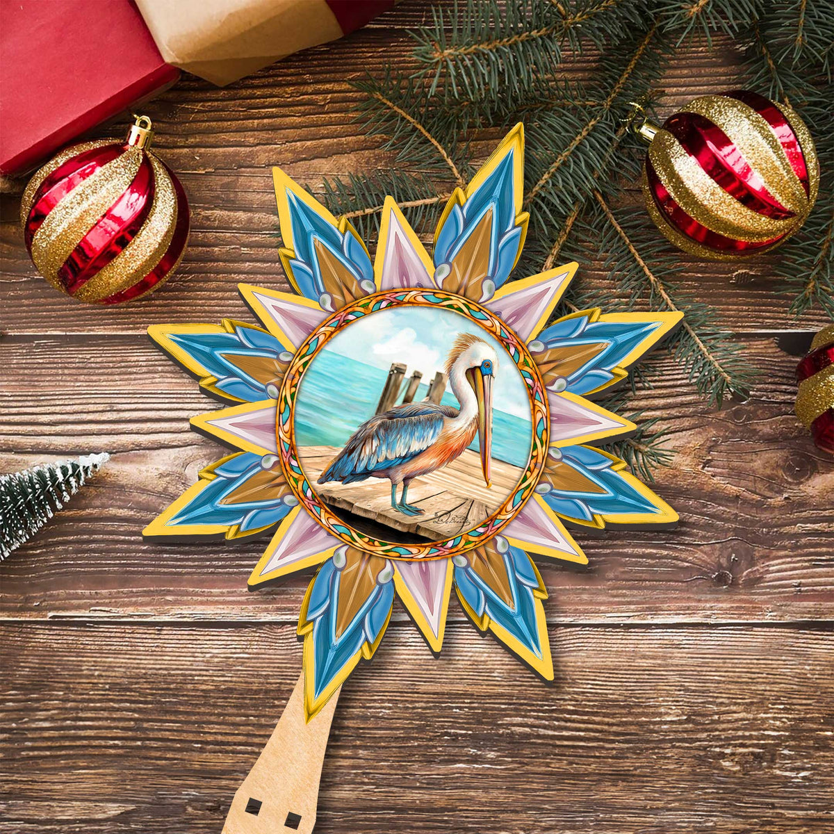 Wooden Coastal Pelican Star Tree Topper by G. DeBrekht featuring a wildlife-inspired pelican design for holiday decor.