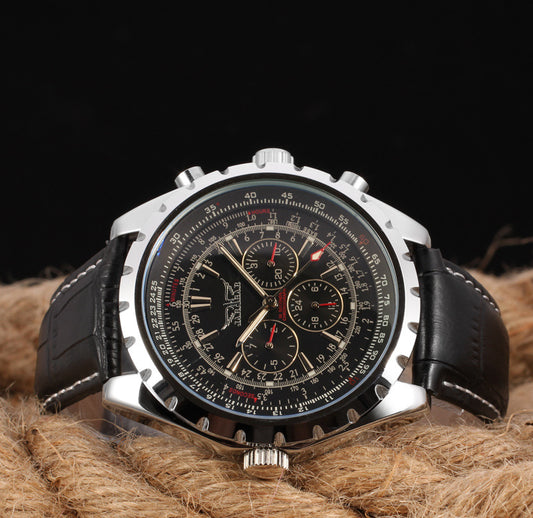 JARAGAR black three-eye six-needle automatic watch with stainless steel band and detailed dial, shown in close-up image.