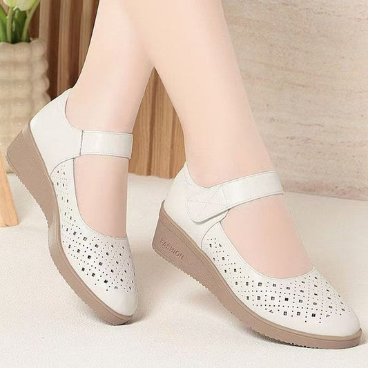 Wedge-heeled women's sandals with soft sole and soft upper in a comfortable open-toe design