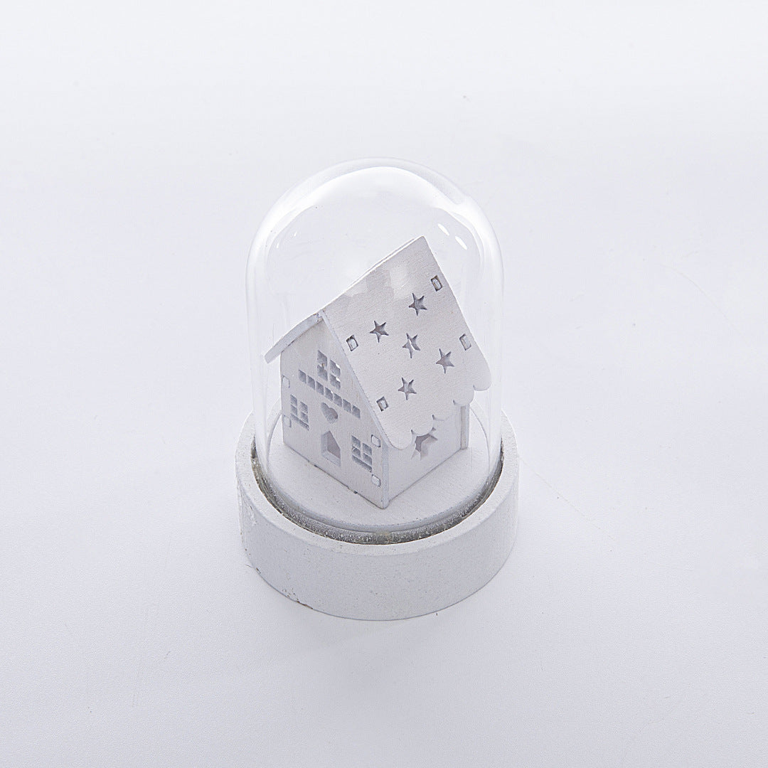 Luminous wooden house Christmas ornament with festive holiday design and glowing windows