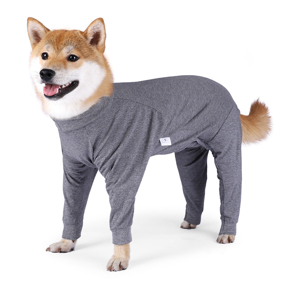 Four-legged dog pajamas with full coverage and high elastic fit, shown on a pet garment display.