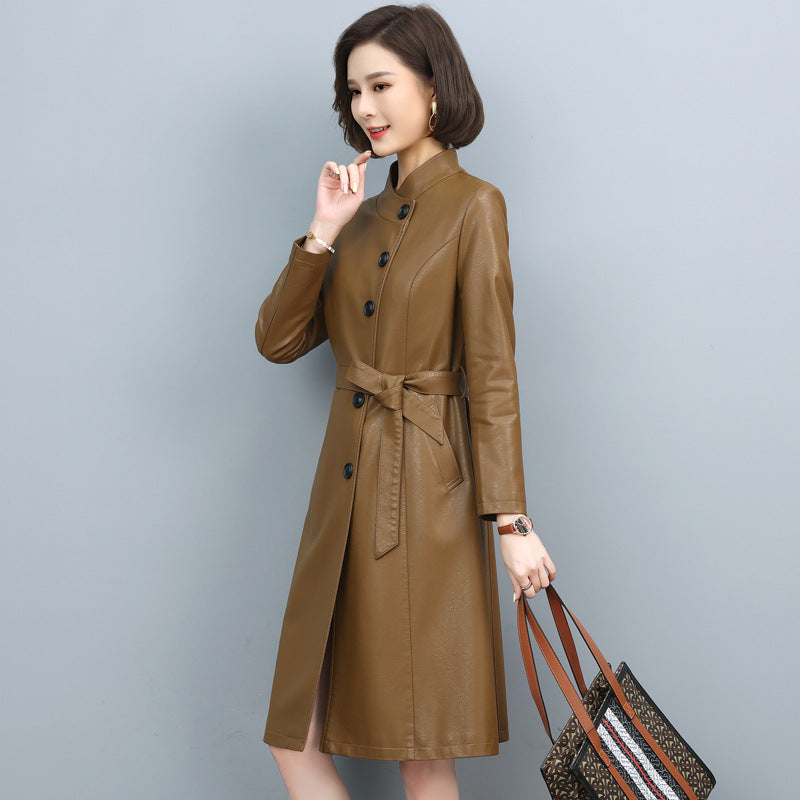 Women’s leather trench coat with turn-down collar, drawstring waist, and long loose sheepskin design