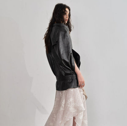 Ebony brown PU leather cloak-style cape jacket with draped silhouette and open front