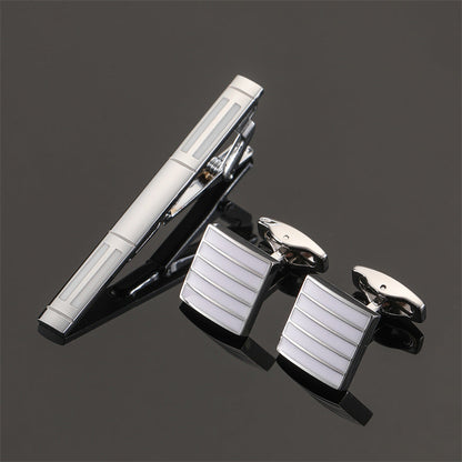 Gold and silver tie clip and cuff buckle set with black crystal rose enamel flower pattern