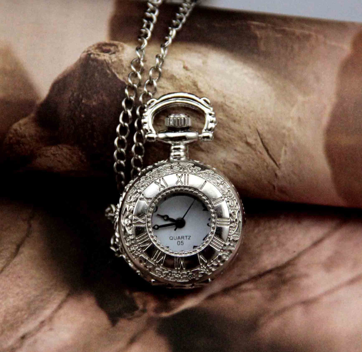 Silver Roman numeral pocket watch necklace with digital display and small round pendant