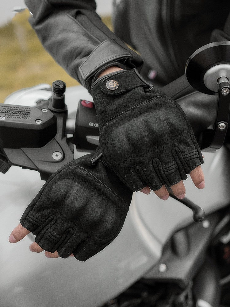 Vintage leather half-finger motorcycle gloves with adjustable wrist straps and reinforced knuckles