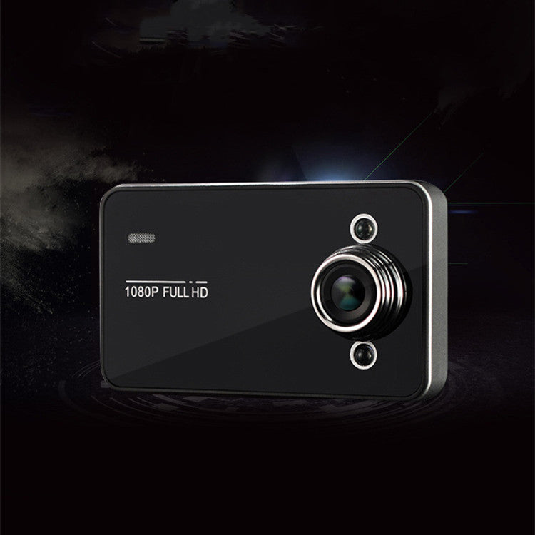 Black hidden car driving recorder mounted discreetly inside a vehicle interior