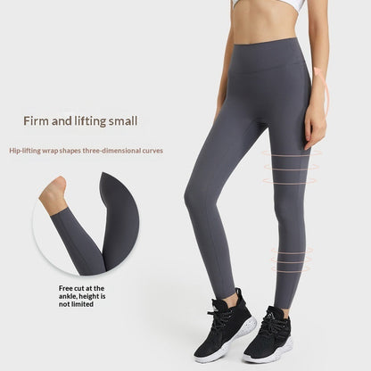 Women's high-waisted butt-lifting yoga pants with seamless design, shown from the back