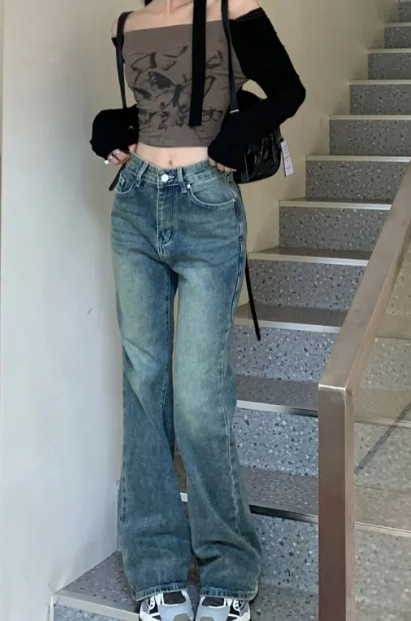 BackUPMYFILESNOW® classic wide-leg jeans displayed on a hanger, showcasing the relaxed fit and denim fabric.