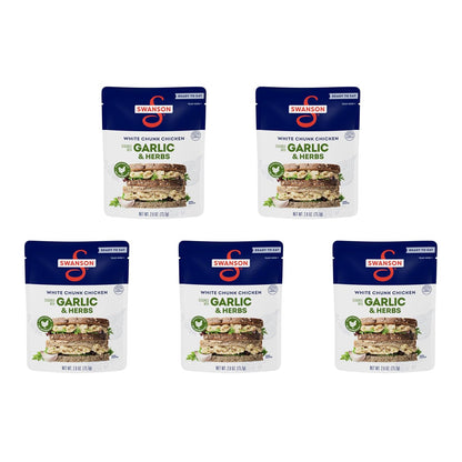 Canned Swanson White Premium Chunk Chicken in Water, 4 cans of 2.4 oz each, showing the product label and cans stacked together.