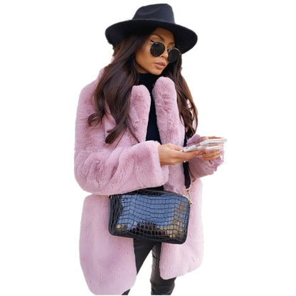 Women's long sleeve lapel faux fur coat in a solid color, styled with a soft fur texture