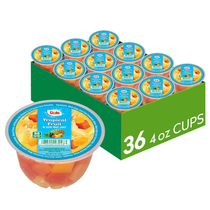 Canned Dole pineapple tidbits and tropical fruit in 4 oz bowls, 12-pack, showing fresh pineapple pieces and mixed tropical fruits.