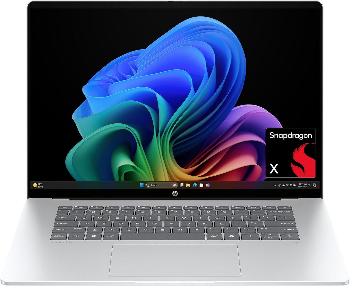HP OmniBook 5 16-inch AI laptop with 2K display, Snapdragon X1, 16GB RAM, 512GB SSD, Glacier Silver, Windows 11 Home.