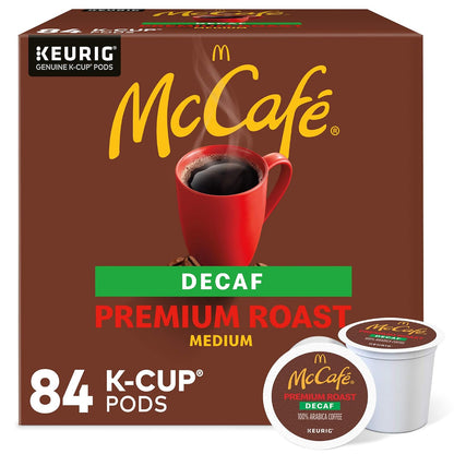 McCafe Premium Roast Decaf K-Cup coffee pods for Keurig, medium roast, 84-count box showing the product packaging.