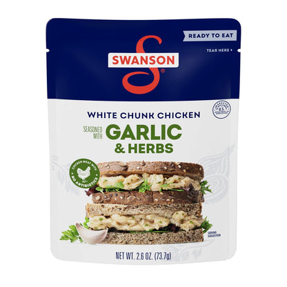 Canned Swanson White Premium Chunk Chicken in Water, 4 cans of 2.4 oz each, with label showing product details and brand logo.