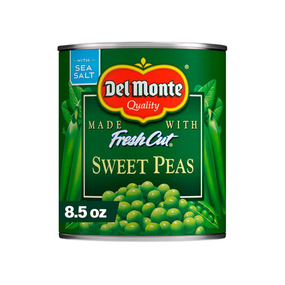 Canned Del Monte sweet peas in 15-ounce cans, fresh-cut green peas packed in a four-pack, ready for cooking or snacking.
