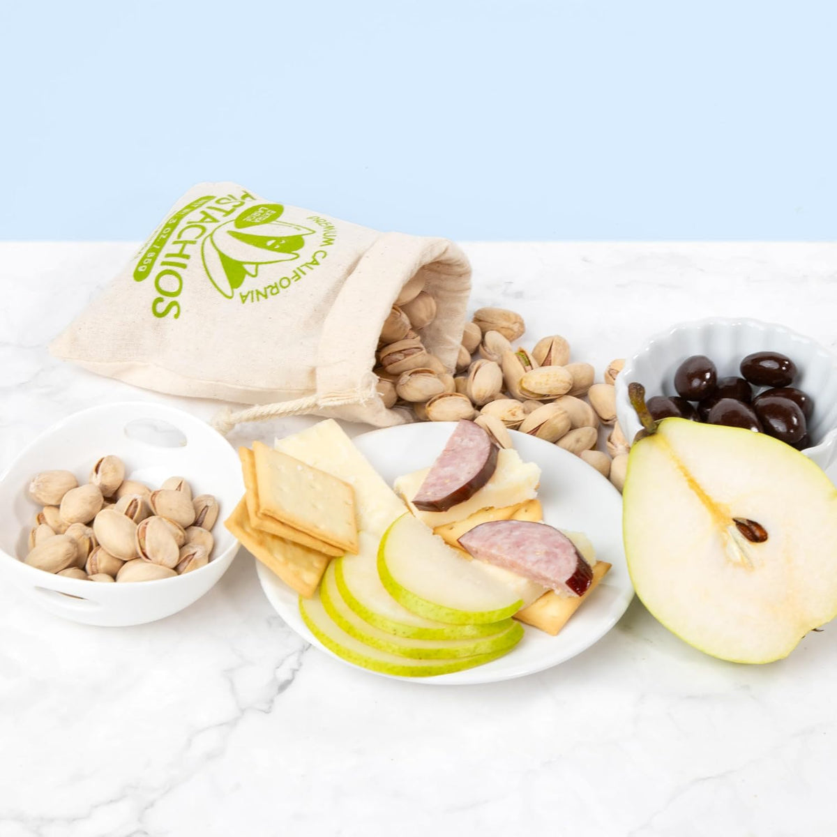 Gourmet gift basket by A Gift Inside with fresh fruit, nuts, meats, and cheeses for holidays, corporate gifts, or get well occasions.