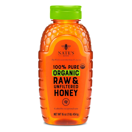 Nate's Organic Honey in a 16oz squeeze bottle, golden honey with a smooth texture, ideal for spreading or drizzling.