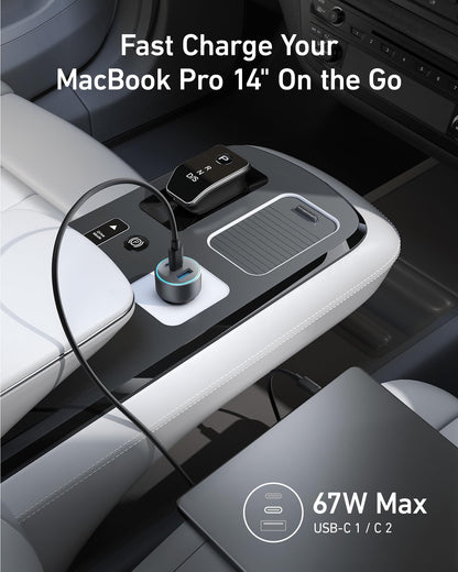 Anker 535 67W car charger with dual USB ports plugged into a vehicle's cigarette lighter socket