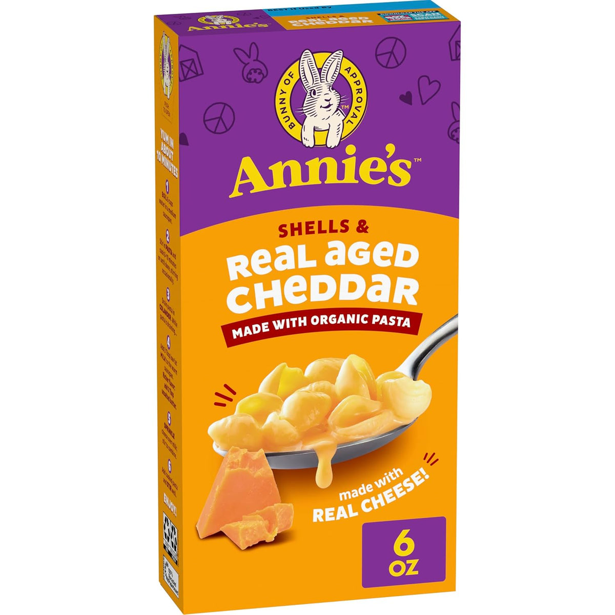 Annie's Homegrown Shells & White Cheddar organic mac and cheese pack with four 24 oz boxes, featuring cheesy pasta shells.