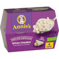 Annie's Homegrown White Cheddar Mac & Cheese microwavable cups, 8-pack, showing the cups with creamy cheese and pasta inside.