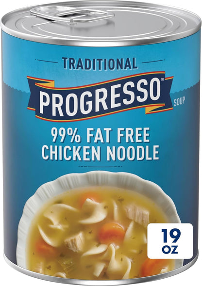 Cans of Progresso Traditional Chicken Noodle Soup, 19 oz, 4-pack, featuring labels with chicken and noodle illustrations