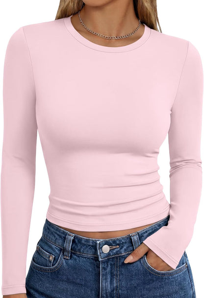 Trendy Queen women's long sleeve T-shirt in fall fashion style, basic Y2K-inspired top with a casual fit and long sleeves.