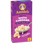 Packaged Annie's Homegrown Shells & White Cheddar Mac and Cheese box, featuring organic pasta and real cheese.