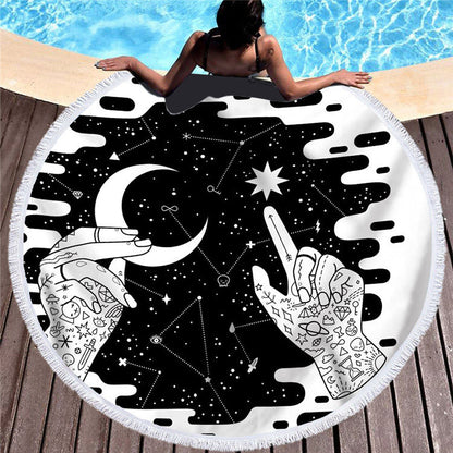Round fringed microfiber beach towel in a colorful patterned design