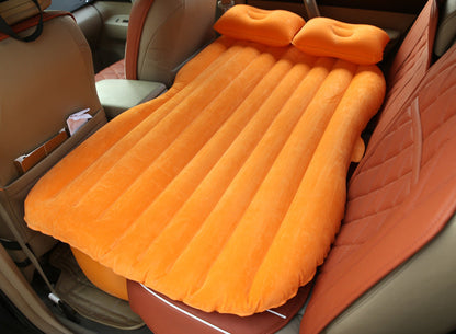 Car inflatable bed with cushioned surface and raised edges for comfortable in-vehicle sleeping