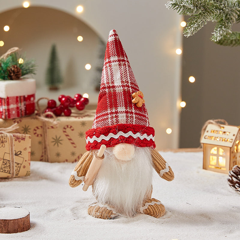 Christmas gingerbread man ornaments hanging as festive tree decorations, featuring colorful holiday details
